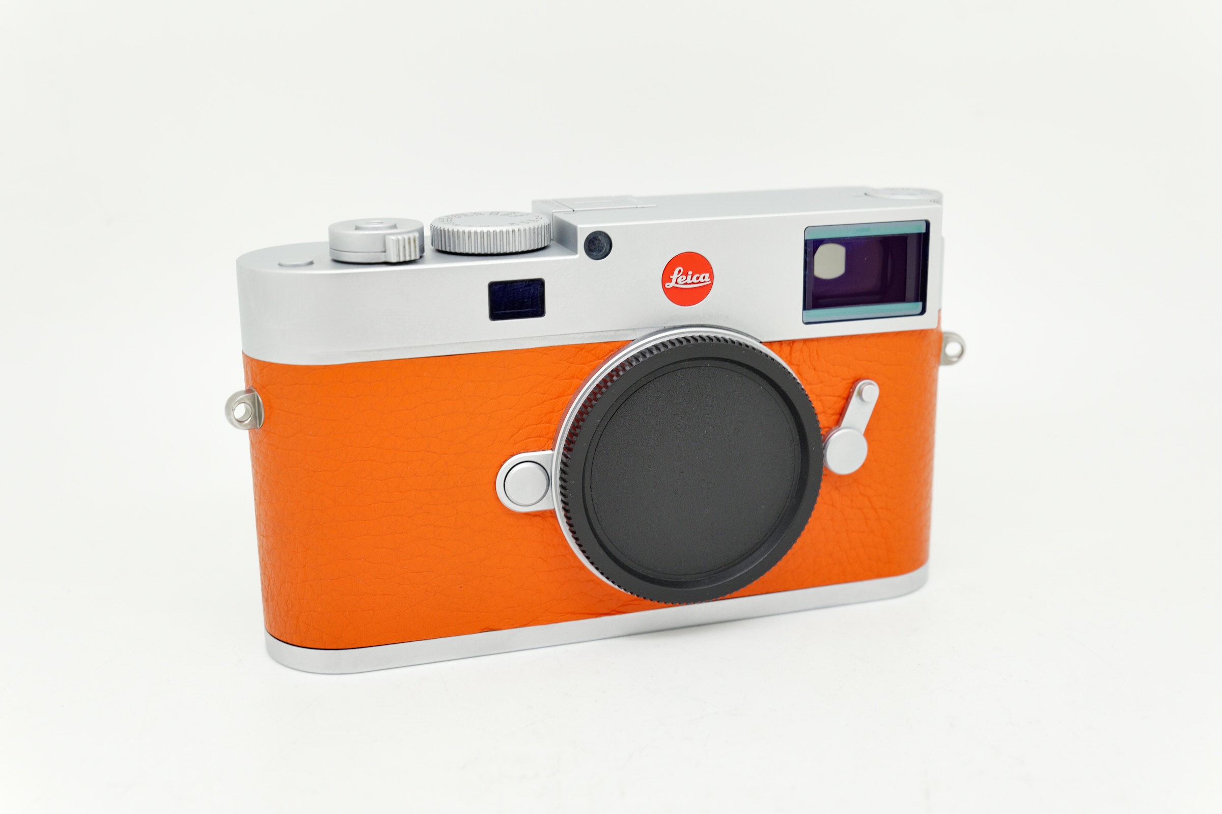 Leica M11 Silver on orange Leatherette