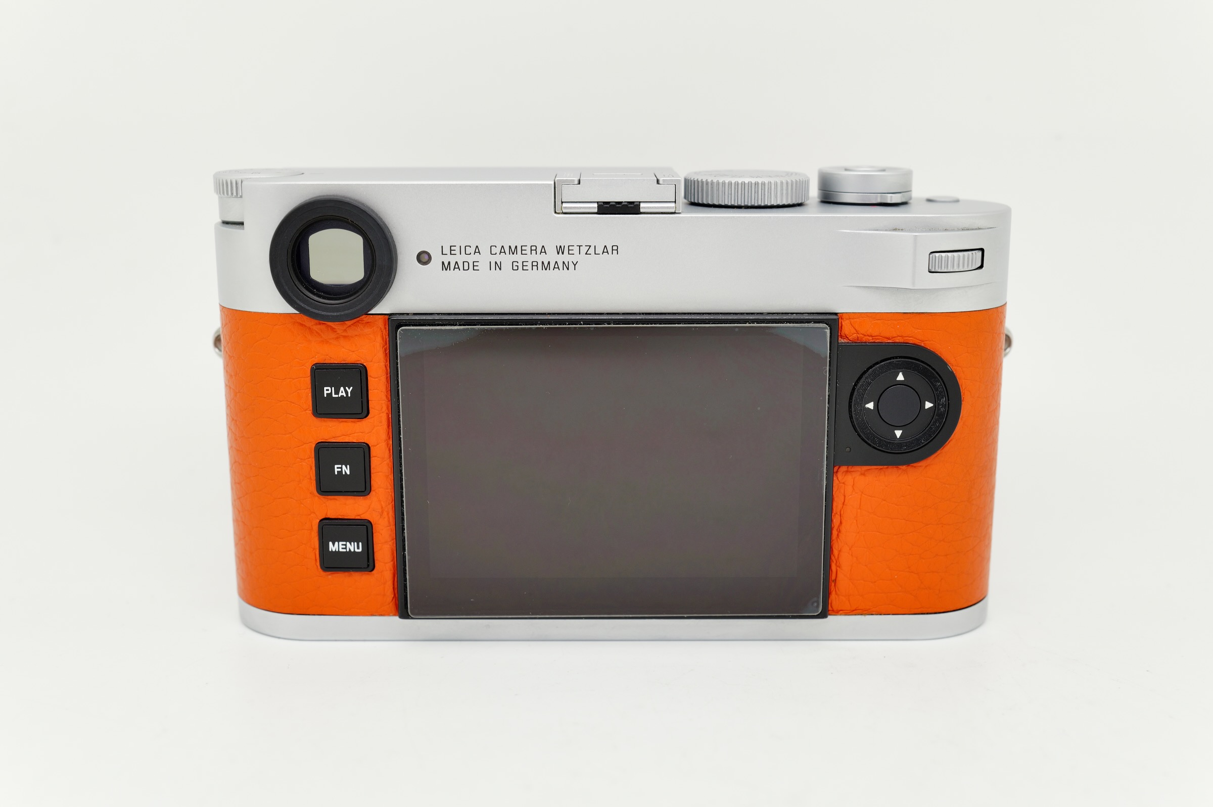 Leica M11 Silver on orange Leatherette