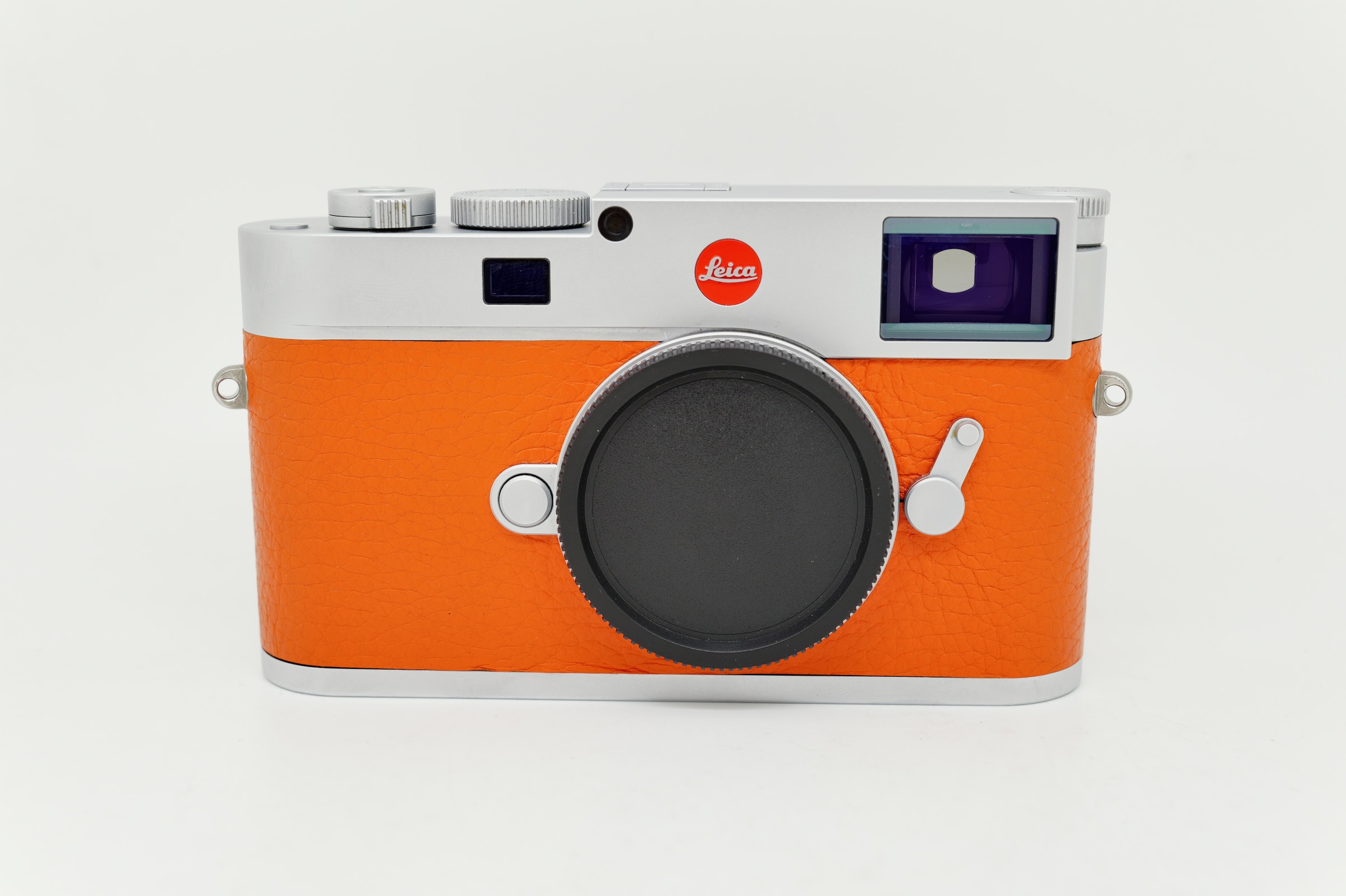 Leica M11 Silver on orange Leatherette